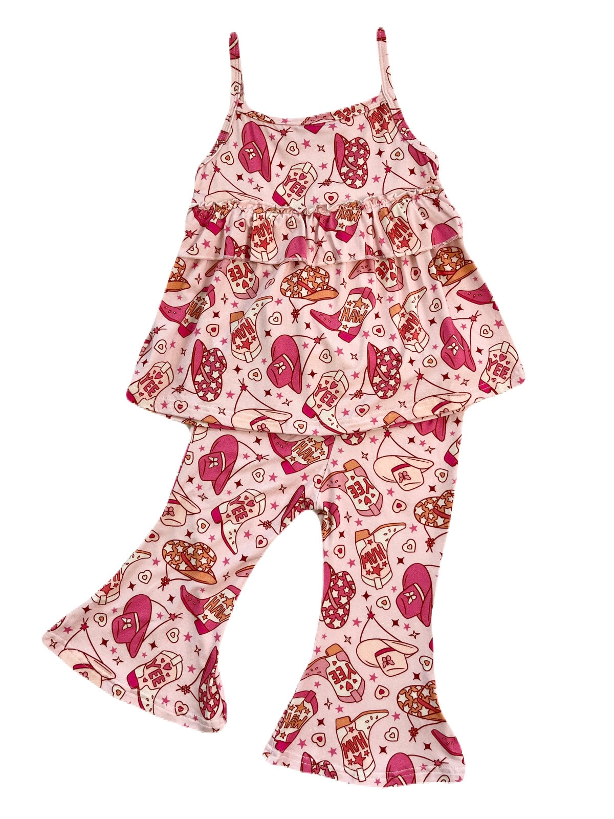 A girl's bamboo spaghetti-strap ruffle tank top and flared pant set with a pink rodeo cowgirl print that features cowboy hats, boots, and the words "yee haw". 