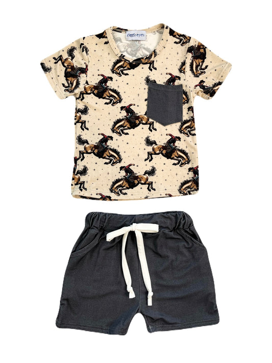 A boys bamboo drawstring shorts and pocket t-shirt set with a rodeo bonc riding print. Shorts are a dark gray colour with a white drawstring.