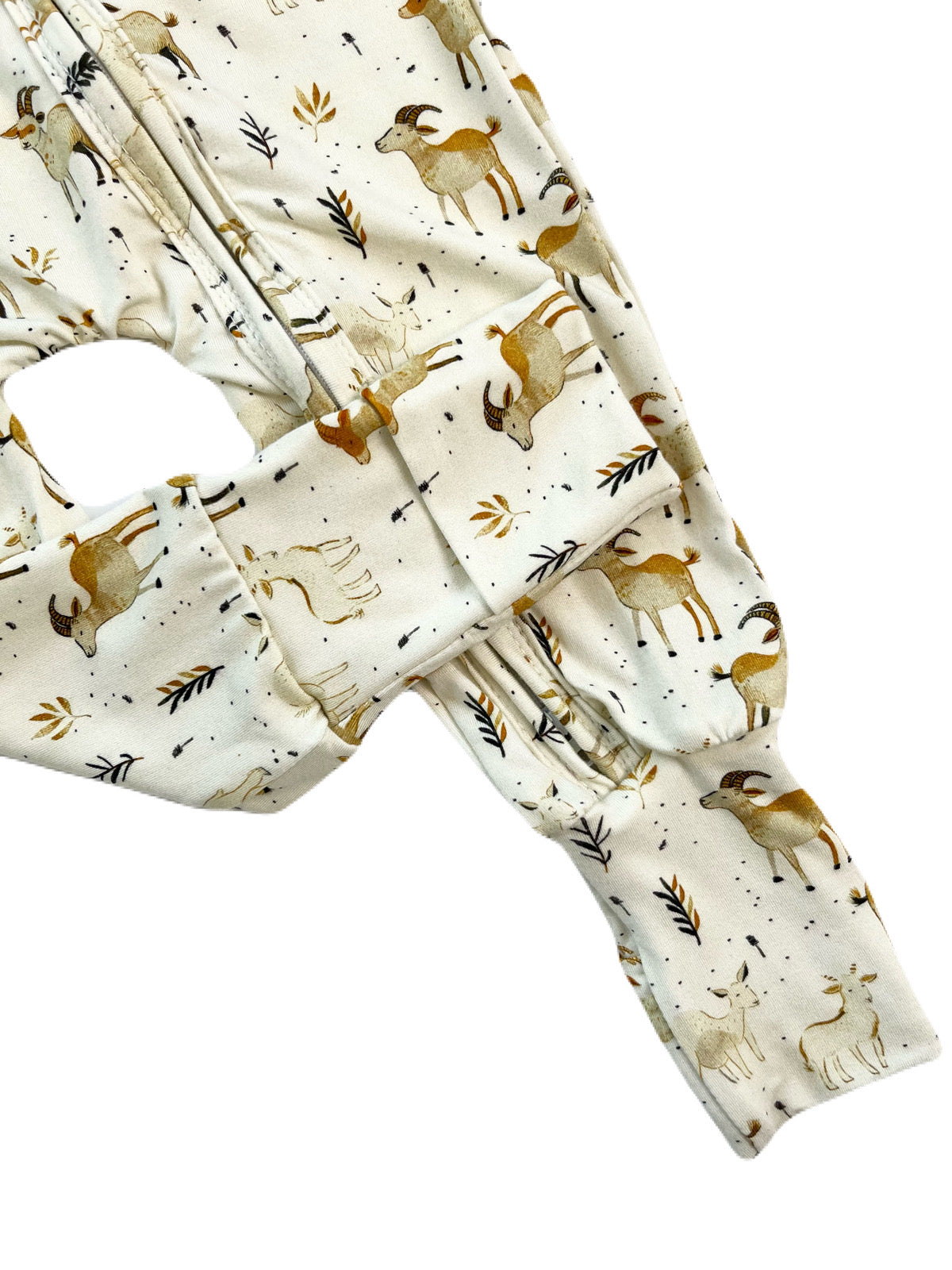 Bamboo zippy sleeper with cream, beige, and golden goat and wheat print. Hs fold-over hand and feet cover, and two-way zipper.