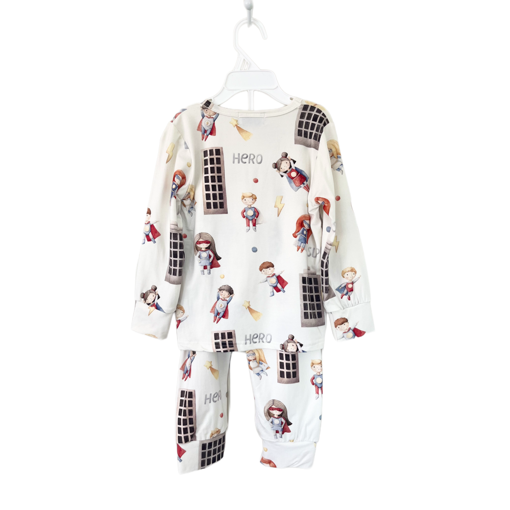 The back of a kids bamboo long-sleeve shirt & pants pajama outfit with superhero pattern