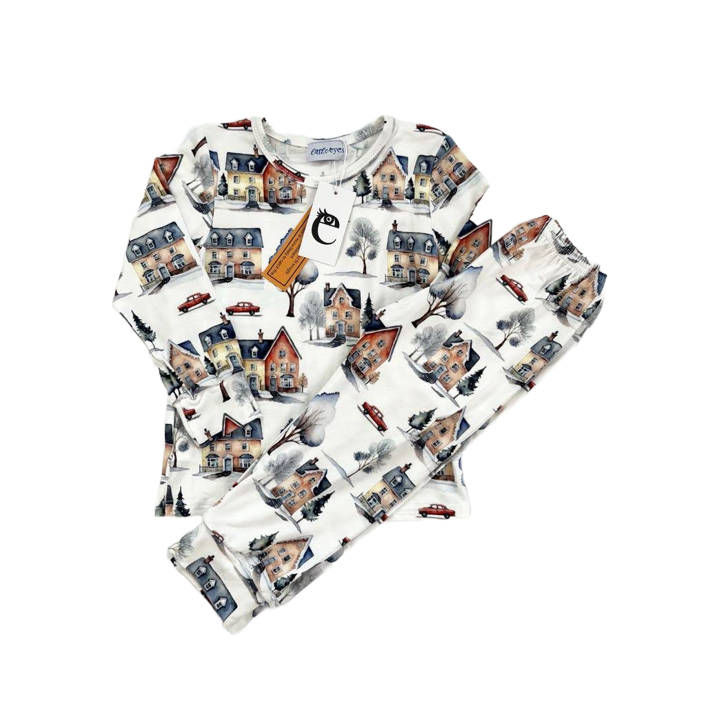 Children’s bamboo pajamas outfit with snowy winter village pattern
