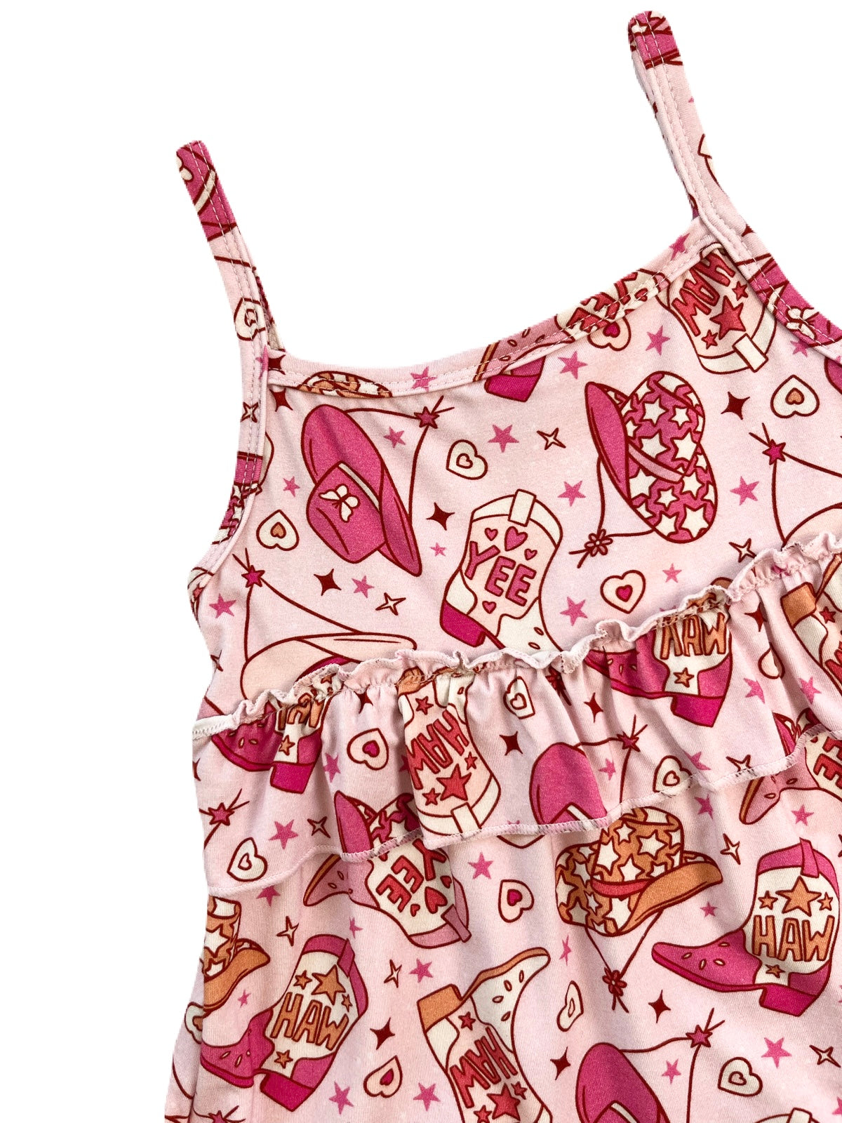 A girl's bamboo spaghetti-strap ruffle tank top  with a pink rodeo cowgirl print that features cowboy hats, boots, and the words "yee haw".