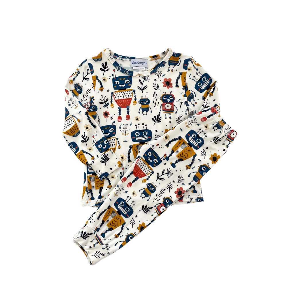 Children’s bamboo long-sleeve shirt & pants pajama outfit with robots and flowers.